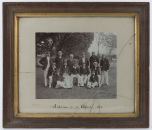 1902 AUSTRALIA XI IN ENGLAND: Team photograph with caption in manuscript, photograph by J. Weston & Son (Eastbourne, England); framed & glazed (cracked glazing), overall 51x45cm. The Australian XI defeated an England XI captained by Gilbert Jessop on 16-18 June,1902 in a game played at "The Saffrons", Eastbourne. The Australian XI prevailed, winning the game by 131 runs, Hugh Trumble taking 14 wickets for the match.