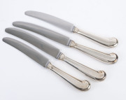 A set of eight sterling silver handled dinner knives and entree knives, early to mid 20th century, (16 pieces). - 3