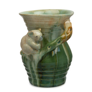 REMUED pottery vase with applied koala and branch handle, incised "Remued 313/5B", 13cm high