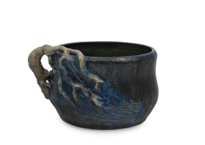 PHILIPPA JAMES pottery vase with applied wind-swept tree decoration glazed in blue and black with green interior, incised "Philippa James, 1925", 8.5cm high, 14.5cm wide