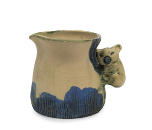 PHILIPPA JAMES pottery jug with rare applied koala handle and sgraffito hand-painted landscape scene, incised "Philippa James", 7cm high, 9cm wide