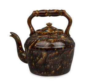 WILSON & RIDGES Colonial teapot with mottled glaze, 19th century. Rare. 25cm high, 26cm wide