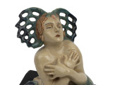 MARGUERITE MAHOOD pottery mermaid statue on original ebonized wooden base, titled "Forsaken Mermaid", circa 1936, incised "Marguerite Mahood" and titled on the plinth, 15.5cm high overall, 13.5cm wide, 13.5cm deep. Illustrated in "AUSTRALIAN ART POTTERY - 2