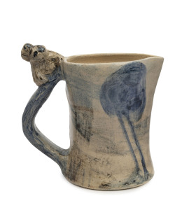 MERRIC BOYD pottery jug with hand-painted rural scene and two applied koalas perched on the branch handle, incised "Merric Boyd, 1941", 14cm high, 15cm wide