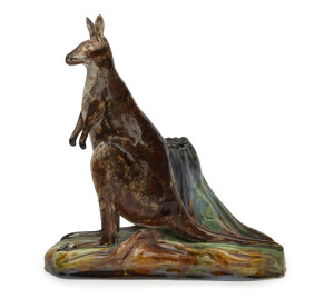 GRACE SECCOMBE pottery kangaroo tree stump vase, incised "Grace Seccombe, N.S.W." with remains of original paper label. Rare. 19cm high, 18cm wide. Illustrated in "AUSTRALIAN ART POTTERY 1900-1950", by Fahy, Freeland, Free and Simpson [Casuarina Press, S