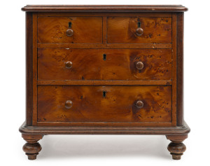 An antique Australian apprentice chest of four drawers, birdseye huon pine and cedar with kauri pine secondary timbers, circa 1875, 35cm high, 39cm wide, 28cm deep