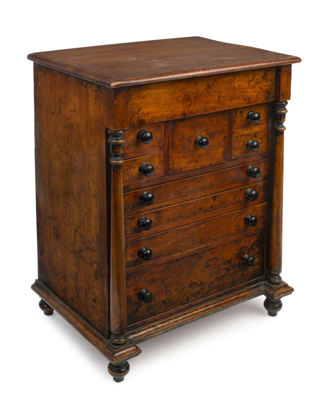 A fine Australian antique apprentice chest of nine drawers with full turned columns and feet, kauri pine, circa 1870, 46cm high, 37cm wide, 26cm deep