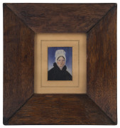ARTIST UNKNOWN (19th century), Miniature portrait of a lady, circa 1820s, watercolour on bone, in contemporary oak frame, overall 20 x 18.5cm.