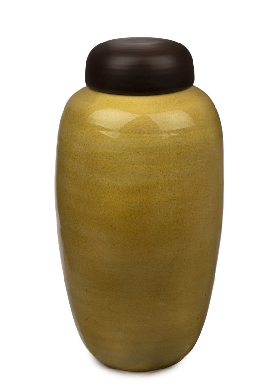 ALLAN LOWE yellow glazed studio pottery vase with brown lid, incised "Allan Lowe", 38cm high.The National Gallery of Australia holds a very similar piece by Lowe.