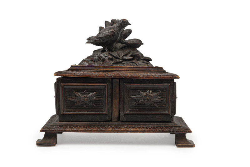 RUDOLPH W. UNGER (Germany, South Australia, 1846-927), rare carved wooden jewellery box in the Black Forest style with unusual pivot swinging compartments, South Australian origin, late 19th century, signed "R. Unger", 14cm high, 18cm wide, 10cm deep