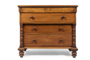 A rare Colonial secretaire chest of drawers, unusual flame cedar frieze with half turned bobbin columns and squat bun feet, Tasmanian origin, circa 1840, 106cm high, 121cm wide, 60.5cm deep