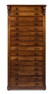 An impressive Colonial solicitors chest comprising of ten single drawers and three double depth drawers with compartments and carved corbels, Australian cedar with Baltic pine secondaries, Melbourne origin, circa 1870, 187cm high, 88cm wide, 82cm deep