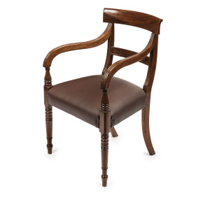 A fine Colonial carver chair, cedar with later brown leather upholstery, New South Wales origin, circa 1835, 51cm across the arms