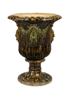 BENDIGO POTTERY terrace urn with mottled majolica glaze, lion masks and swag decoration, 19th century, 60cm high, 49cm diameter
