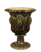 BENDIGO POTTERY terrace urn with mottled majolica glaze, lion masks and swag decoration, 19th century, 60cm high, 49cm diameter