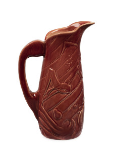 MABEL TURNER Art Deco style pottery jug with burgundy glaze, adorned with flying gulls, incised "Mabel Turner", 27cm high