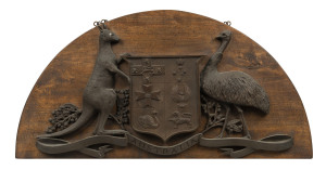 An Australian Coat of Arms, cast bronze mounted on timber panel, late 19th century, 40cm high, 77cm wide