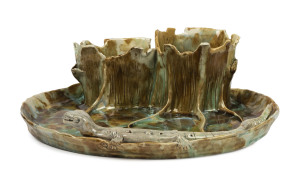 DELAMERE pottery centrepiece with applied lizard and tree stump decoration, incised "Delamere", 31cm wide