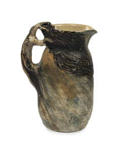 PHILIPPA JAMES pottery jug with wind-swept tree decoration and applied branch handle, incised "Philippa James", 16cm high