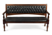 A billiard room settle, solid blackwood with diamond studded black leather upholstery, Melbourne origin, circa 1880, ​