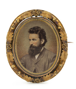 An antique Australian gold memorial brooch set with double sided swivel hand-coloured ambrotype photo portrait panels, 19th century, inscribed "JANE DENMAN & JOSEPH BECKER MARRIED AT SYDNEY, 1868", 5.5cm high