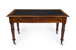 W.H. ROCKE & Co. Australian cedar, two-drawer writing table with insert leatherette top, circa 1880, oval brass "W.H. ROCKE & Co. MELBOURNE", 80cm high, 138cm wide, 77cm deep