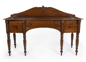 An early Colonial sideboard, superbly crafted in Australian ribbon cedar with six finely turned legs, unusual half turned corbels and carved back, Sydney, New South Wales origin, circa 1825, 124cm high, 181cm wide, 58cm deep