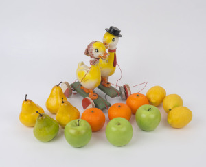 EDUCA LUX vintage French pull along duckling toy together with 13 assorted pieces of vintage plastic fruit, mid 20th century, (14 pieces total), ​the toy 28cm high