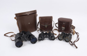Three pairs of leather cased binoculars by "Asahi" (Japan), the smallest pair made by "Myrix" (Paris), 20th century, (3 items), the largest 19cm high, 22cm wide in case.