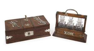 A miniature oak cased three bottle tantalus set with key; and a cigarette/cigar table box, oak and silver plate, early 20th century, (2 items), the tantalus 19cm high, 21cm wide, 9cm deep