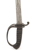 A fine English military sword with finely decorated and etched polished steel blade marked "Reeves and Co, Manufacturers Toledo Works, Charlotte St. Birmingham" with Victoria Regina Royal cypher, leather and steel braid grip and decorative steel guard hil - 2