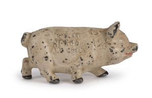 "NORCO FOUNDARY & SPECIALTY Co. POTTSTOWN PA." novelty pig moneybox, painted cast iron, circa 1900, stamped "BUY AT NORCO AND SAVE", 15cm long