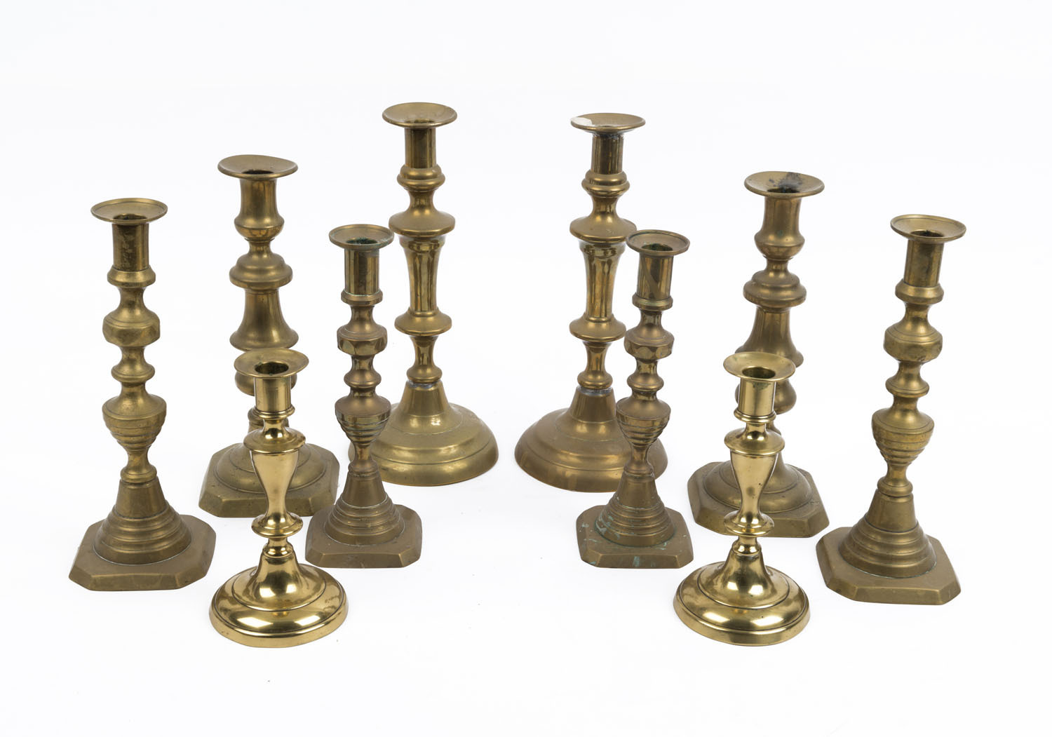 Ten assorted antique and vintage brass candlesticks, 19th and 20th