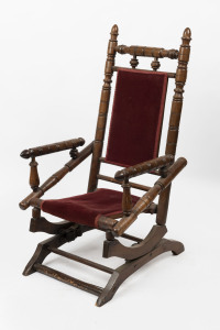 An American walnut bobbin turned spring back rocking chair, late 19th century, 105cm high, 56cm wide, 43cm deep