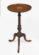 A Sheraton Revival occasional table with cabriole legs and fan marquetry inlay, early 20th century, 47cm high, 24.5cm diameter