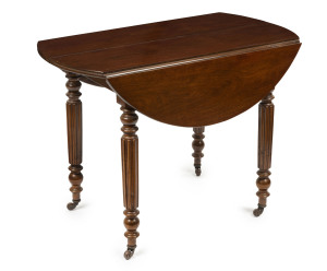 An antique English mahogany drop-side occasional table with turned and fluted legs, early 19th century, 72cm high, 96cm wide, 52cm deep (extends to 93cm diameter)