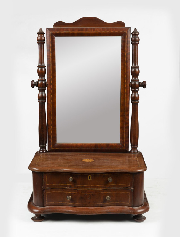 A Sheraton Revival toilet mirror, mahogany with serpentine front and two drawers, early 20th century, ​75.5cm high, 45cm wide, 28cm deep