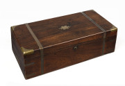 An antique English writing box, rosewood with brass bound edges and flush carrying handles, mid 19th century, 18cm high, 60cm wide, 29cm deep