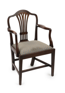 A Georgian Hepplewhite camel back mahogany armchair with fretted back slat, late 18th century, ​58cm across the arms