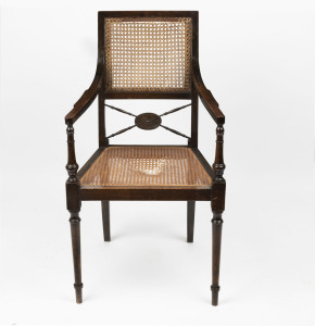 An English walnut armchair with cane seat, early 20th century, ​52cm across the arms