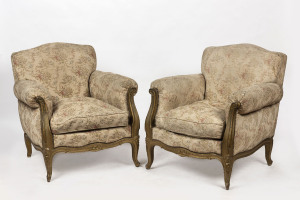 A pair of vintage armchairs, floral tapestry upholstery with gilt carved timber frames, 20th century, 83cm across the arms