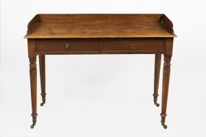 An antique English mahogany two drawer desk with gallery, early 19th century, 80cm high, 108cm wide, 51cm deep