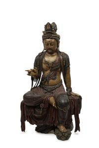 GUANYIN antique Chinese statue seated on a tree stump, carved wood with polychrome finish and insert glass eyes, Ming Dynasty, Wan-Li period 16/17th century, 121cm high. PROVENANCE: The Judith Heaven an the late Barrie Heaven collection, South Australia.