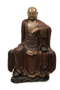 A seated LOHAN antique Chinese statue, carved wood with polychrome finish and inset glass eyes, Ming Dynasty, Wan-Li period 16/17th century, 122cm high. PROVENANCE: The Judith Heaven an the late Barrie Heaven collection, South Australia.