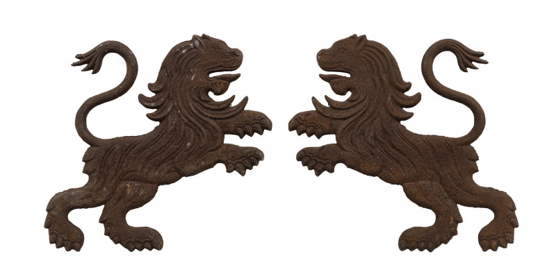 A pair of French cast iron lion plaques, 19th/20th century, ​42cm high, 56cm long