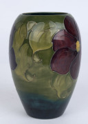 MOORCROFT "Clematis" English pottery vase on green blue ground, circa 1920s, stamped "Moorcroft, Made in England", with hand signed "W. M" monogram, ​17.5cm high - 2