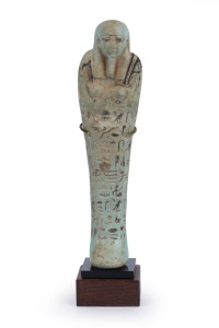 An Egyptian azure faience USHABTIS, late period, 660-33- B.C. With a certificate of authenticity from B.C. Galleries, Armadale, Melbourne. 16cm high.