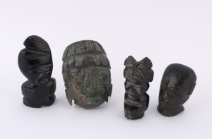 Four carved stone tribal idols, Central American and Southeast Asian, the largest 11cm high