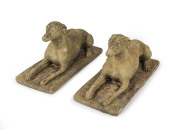 A pair of antique composition stone reclining greyhound garden statues, 41cm high, 71cm long