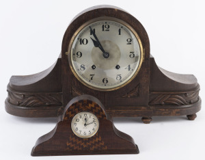 Two Napoleon hat clocks, one in oak case and one with Australian timbers, early to mid 20th century, the larger 32cm high